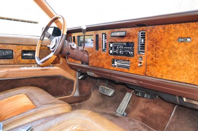 Real English Walnut veneer trim on the dash and door panels
