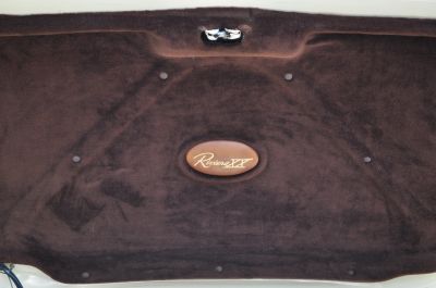 Dark brown linning on the trunk lid with a XX badge
