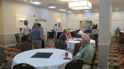 Members enjoying the ROA Hospitality Room
