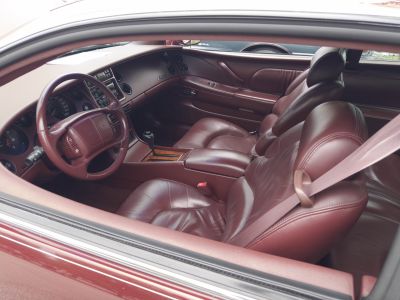 Eighth Generation … 1997 Optional Bordeaux Red Bucket Seat Interior
